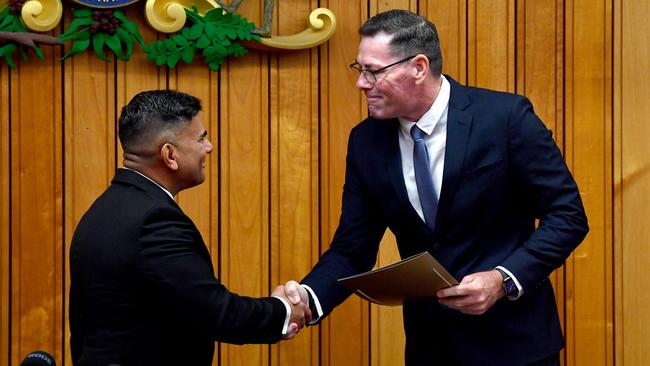 Townsville City Council’s former chief executive Prins Ralston congratulates the newly sworn-in mayor Troy Thompson. Two days later, Dr Ralston announces his resignation. Picture: Evan Morgan