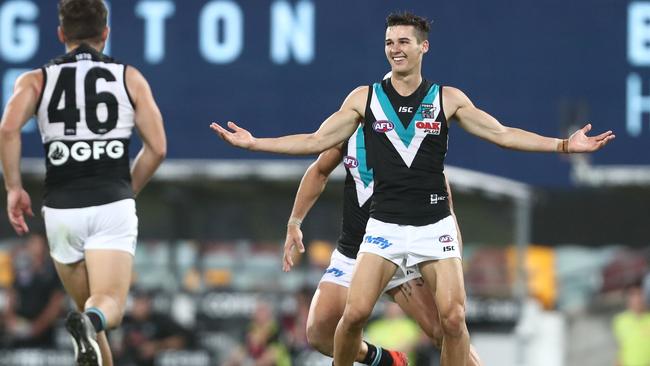 Connor Rozee celebrates one of his five goals against Brisbane Lions. Picture: Chris Hyde/Getty Images. 