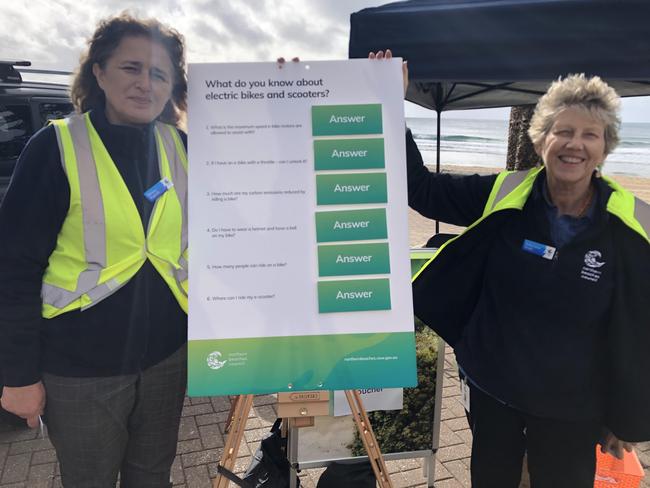 Northern Beaches Council road safety awareness staff Pavica Kupcal (left) and Robynann Dixon joined Northern Beaches Highway Patrol police officers on the beachfront at Manly on Wednesday, The council is conducting a safety audit and an e-bike/e-scooter survey. Picture: Jim O'Rourke