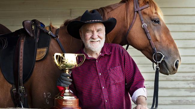 Charlie Lovick with Pam the Thoroughbred ex-race horse and the Lexus Melbourne Cup.