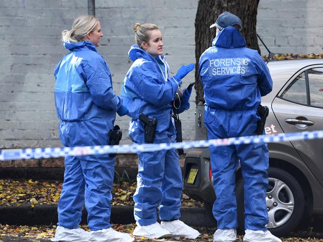 Forensic officers at the scene. Picture: Tracey Nearmy