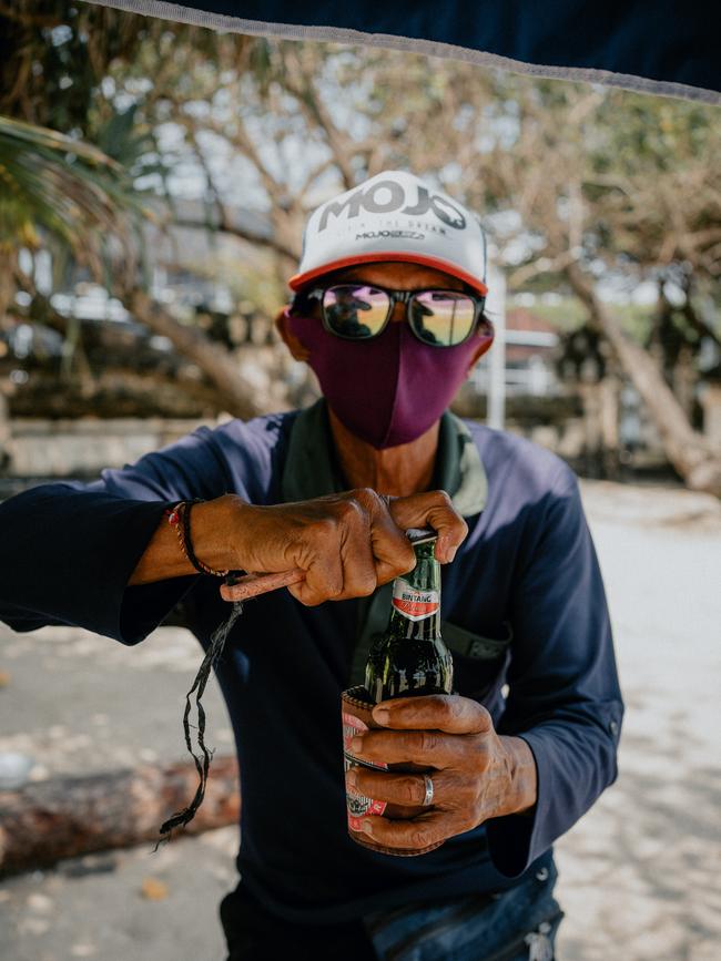 A beer on the beach near Kuta is still possible, just without the crowds. Picture: Bali Buddies