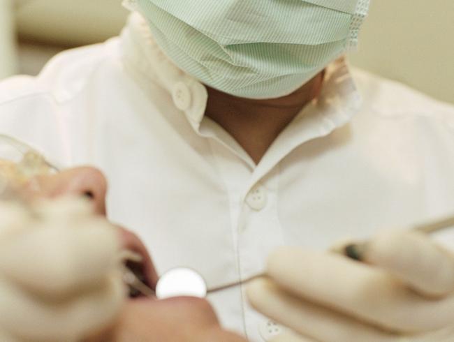 Dentist with patient