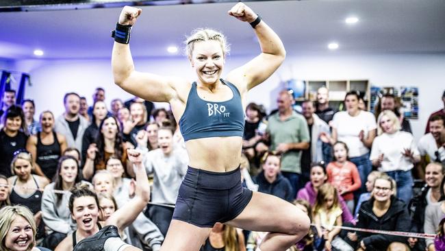 Lou after she set the record for the most burpees in 24 hours in 2019. Picture: EDDIE SAFARIK