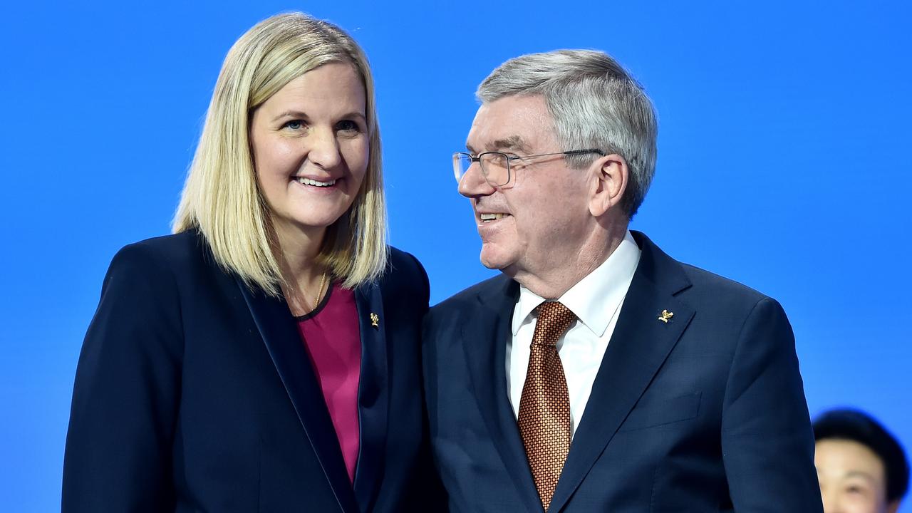 Kirsty Coventry speaks with Outgoing IOC President, Thomas Bach after being elected. (Photo by Milos Bicanski/Getty Images)