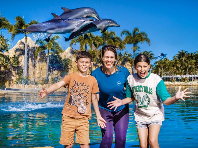 Hayley Davis from Scenic Rim with children Ahna, 12 and Sutton, 8, at Sea World on the Gold Coast. Picture: Nigel Hallett