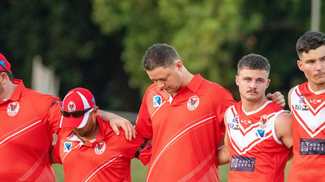 The Waratahs pay tribute to late, great ruckman Alexander ‘Rooch’ Aurrichio at the first game under lights at Gardens Oval. Picture: Aaron Black/AFLNT Media