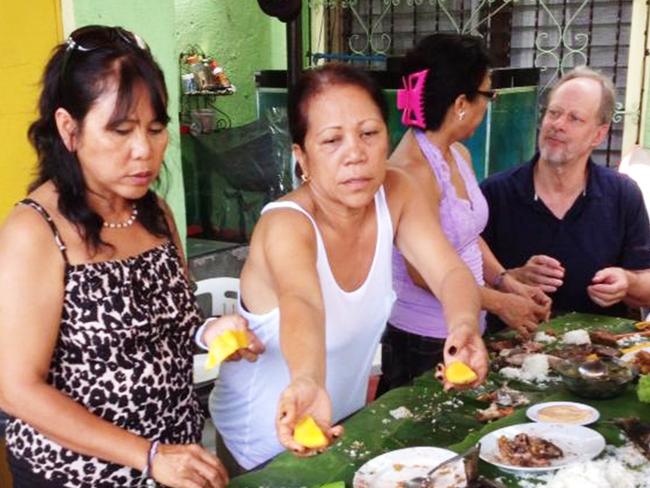 Las Vegas shooter Stephen Paddock sharing a meal with Marilou Danley's family in Manilla in 2013.