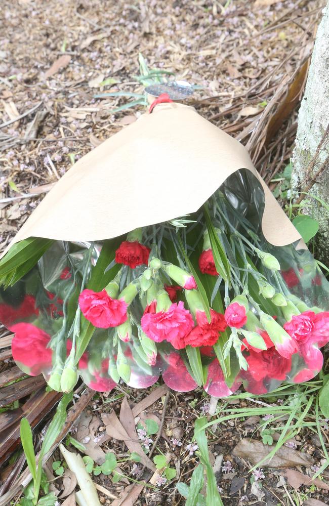 Flowers left outside the unit complex. Picture: Richard Gosling