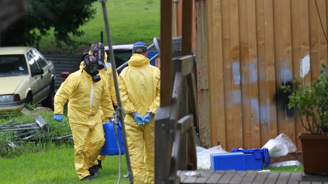 Police and forensic units removing drug making equipment from a house in Rosebud.