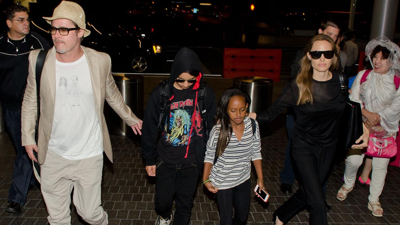 Zahara with her parents and older brother Maddox at LAX in 2014. (Photo by GVK/Bauer-Griffin/GC Images)