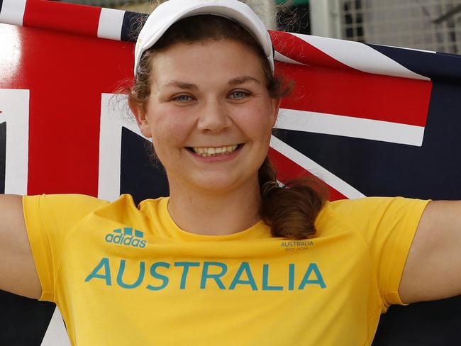 Catherine Skinner of Australia celebrates winning the gold medal during the victory ceremony for the women's trap event at the 2016 Summer Olympics in Rio de Janeiro, Brazil, Sunday, Aug. 7, 2016. (AP Photo/Hassan Ammar)