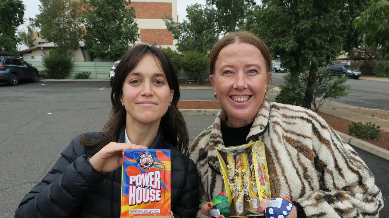 Jemimah and Christine with their Territory Day fireworks. Picture: Gera Kazakov