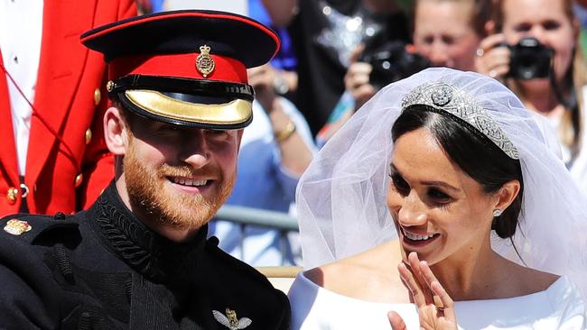 Prince Harry and Meghan Markle greet crowds after the ceremony. Photo credit: Chris Jackson/WPA Pool /MEGA