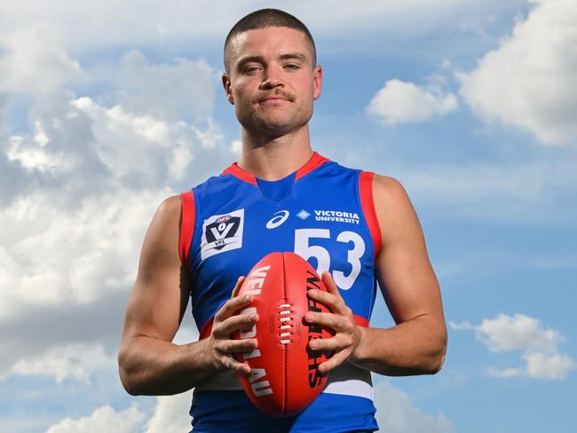 Lachlan Sullivan in his role as captain for Footscray. Picture: Morgan Hancock/AFL Photos via Getty Images