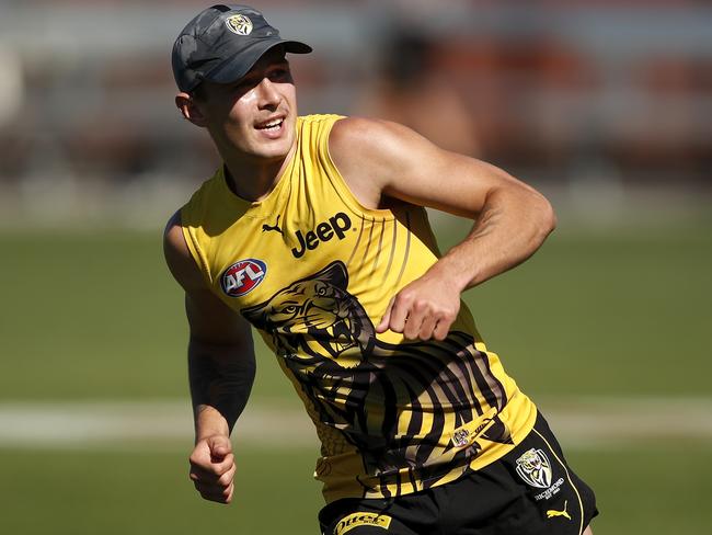 MELBOURNE, AUSTRALIA - FEBRUARY 18: Rhyan Mansell of the Tigers looks on after kicking a goal during a Richmond Tigers training session at Punt Road Oval on February 18, 2021 in Melbourne, Australia. (Photo by Dylan Burns/AFL Photos via Getty Images)