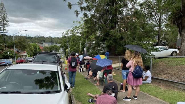 Some had to be brought food from family members as Ipswich residents waited in line for hours on end to get tested. Picture: Jessica Baker