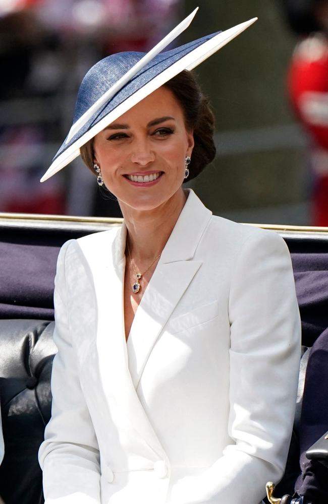 Britain's Catherine, Duchess of Cambridge smiles, on her way to the Queen's Birthday Parade. Picture: Andrew Matthews / AFP