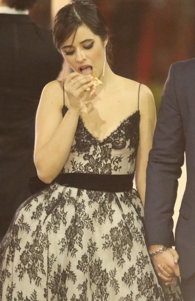 Camila Cabello tuck into an In-N-Out burger after the Vanity Fair party. Picture:Max Lopes- Vasquez-clint / BACKGRID