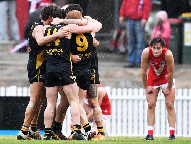 SANFL: North v Glenelg -Glenelg celebrate the final siren and a 3 point win over North at Prospect OvalSunday,August 5,2018 (Image AAP/Mark Brake)