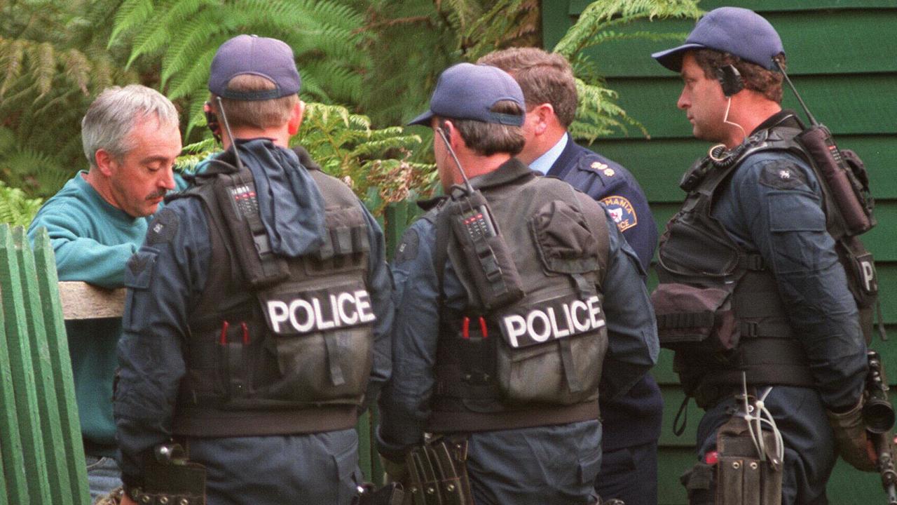 Police near the scene of the siege at Seascape Cottage guesthouse, after gunman Martin Bryant went on his rampage.