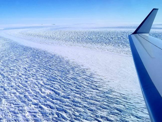 MELT: This NASA photo shows ripples in the surface of Denman Glacier in East Antarctica that throw shadows against the ice. Billions of tonnes of ice have been lost. Picture: NASA/AFP