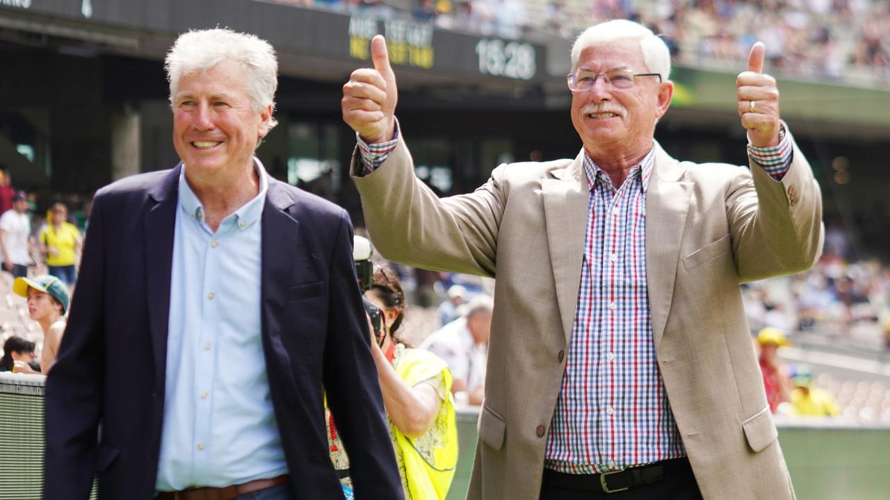 Former New Zealand cricketers John Wright (left) and Sir Richard Hadlee react to New Zealand supporters on day 3 of the Boxing Day Test match between Australia and New Zealand at the MCG in Melbourne, Saturday, December 28, 2019. (AAP Image/Michael Dodge)