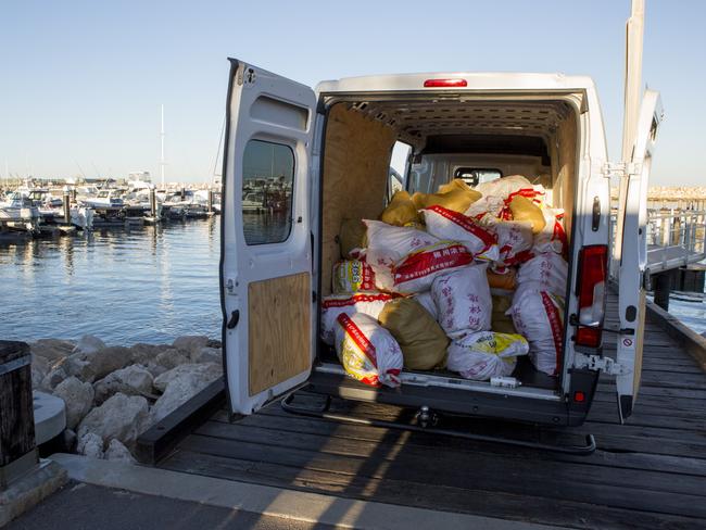 Bags from the boat were loaded into a van which met it.