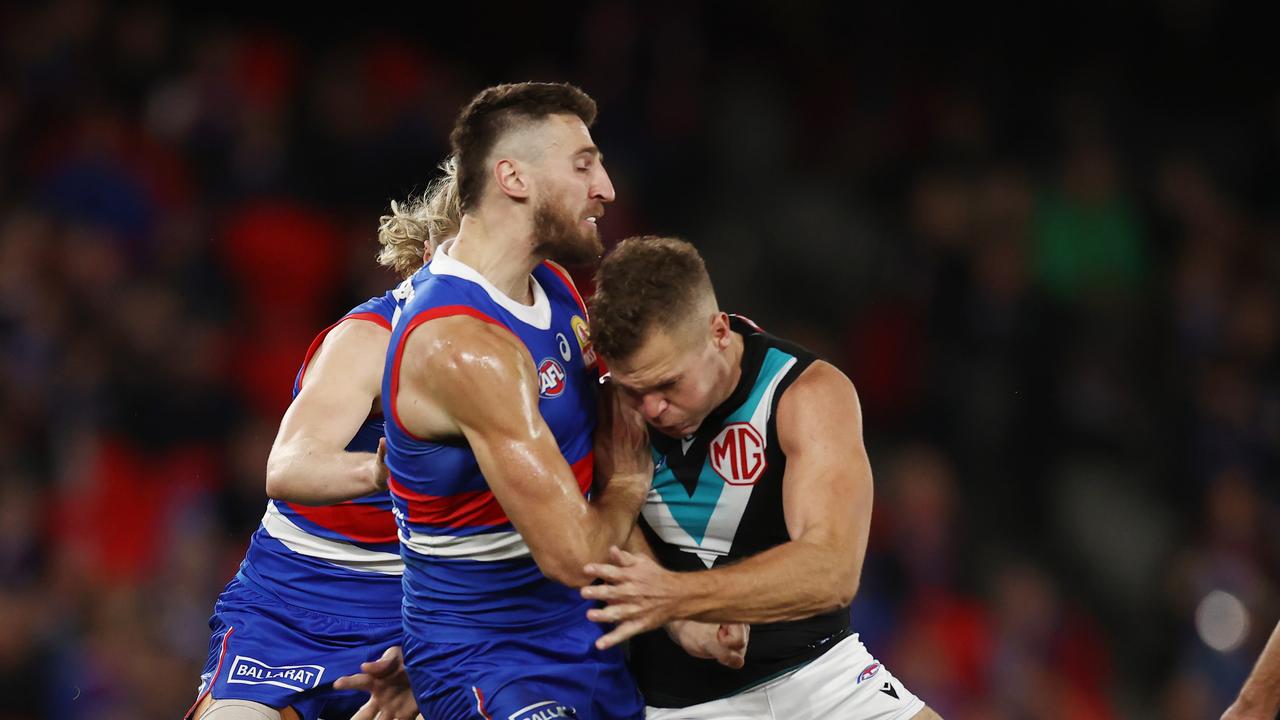 Bontempelli collides with Port Adelaide’s Dan Houston. Photo by Michael Klein.