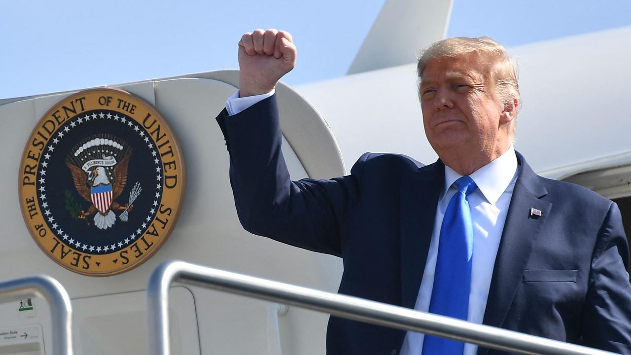 Trump with his infamous fist-bump as arrives at John Wayne Airport in Santa Ana, California on March 30, 2023. Picture: Mandel ngan / AFP