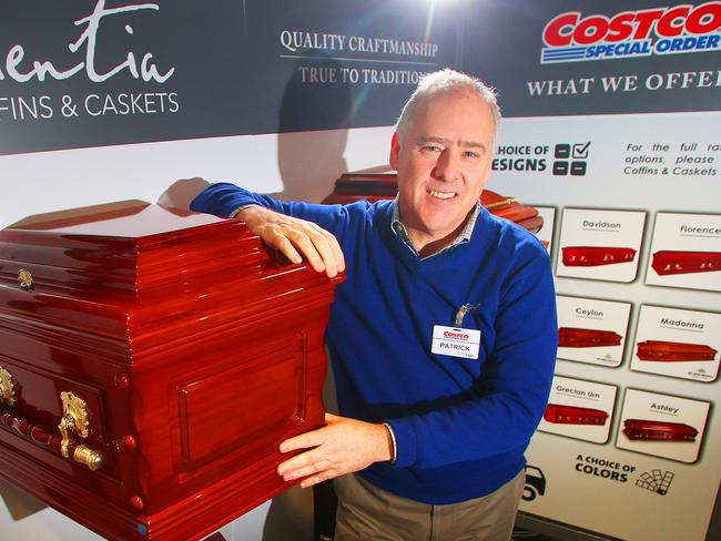 Costco’s country manager Patrick Noonan with a sample of the coffins available at their stores.