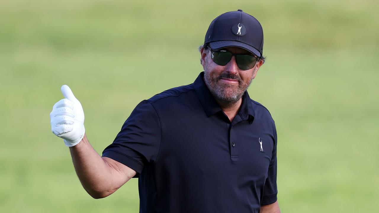 Mickelson smiled despite a horror day at the US Open. (Photo by Rob Carr/Getty Images)