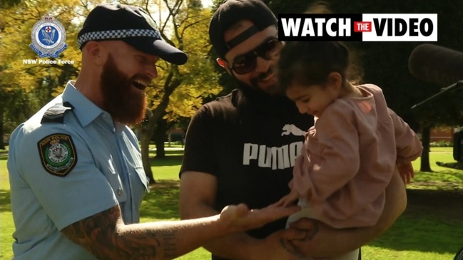 Emotional moment toddler is reunited with cop who saved her life