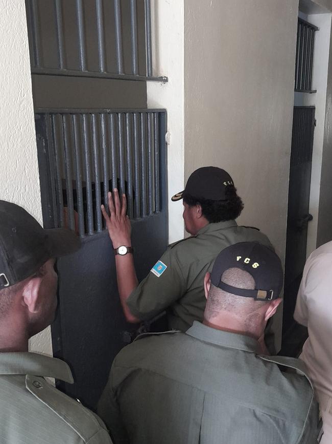 Commissioner Panapasa inspects a Fiji prison cell.