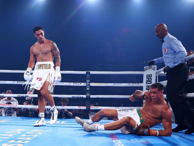 Jai Opetaia knocks down David Nyika during the IBF And Ring Magazine Cruiserweight World Title Fight. Picture: Getty Images