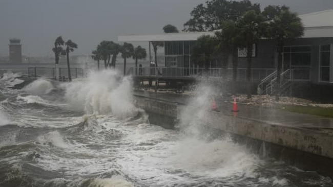 Waves crashed against a St. Petersburg pier as Hurricane Milton charged toward Florida this week. Picture: Bryan R. Smith/AFP/Getty Images