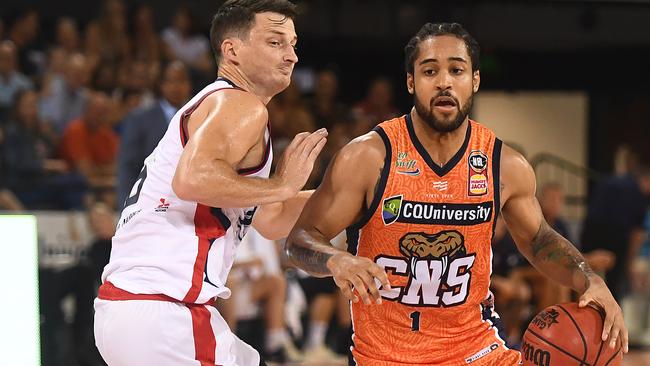 CAIRNS, AUSTRALIA — FEBRUARY 02: Melo Trimble of the Taipans drives to the basket past Shaun Bruce of the 36ers during the round 16 NBL match between the Cairns Taipans and the Adelaide 36ers at Cairns Convention Centre on February 02, 2019 in Cairns, Australia. (Photo by Ian Hitchcock/Getty Images)