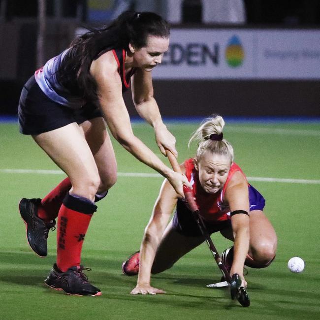 Souths veteran Sue Whipp was in the thick of the action at the Cairns Hockey Women's A Grade match between South Cairns and Trinity Stingers. PICTURE: BRENDAN RADKE