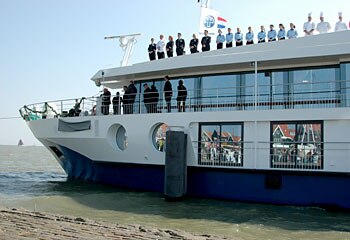 Avalon Poetry ... the crew of the river cruiser line up to greet passengers