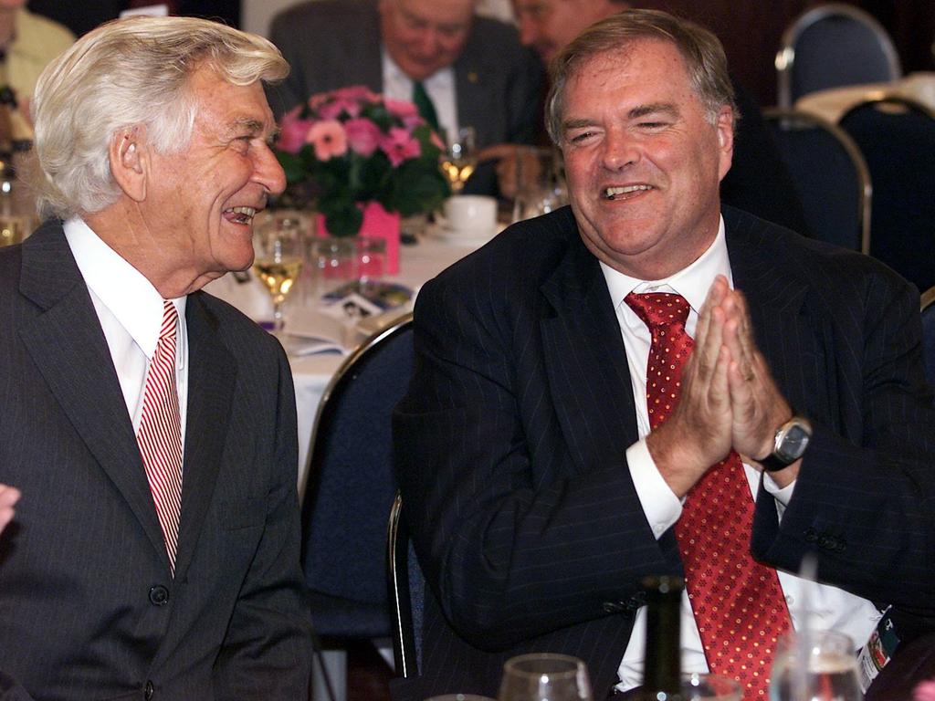 Kim Beazley attends a Labor Party function at Randwick racecourse, sitting next to former leader Bob Hawke.