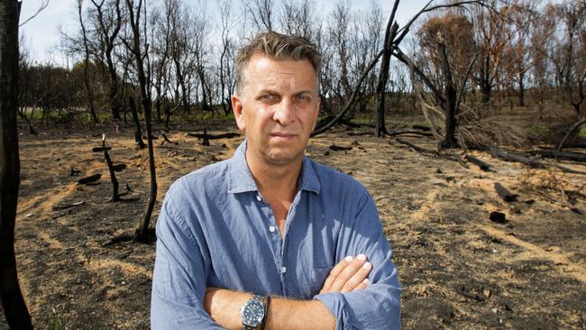 NSW minister Andrew Constance with wife Jennifer at bushfire burnt Pretty Point in Malua Bay on the NSW South Coast. Picture Rohan Kelly