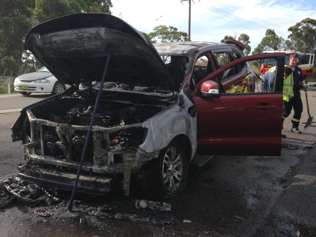 2015 Ford Everest catches fire while being road tested by CarsGuide journalist Peter Barnwell. Picture: Supplied