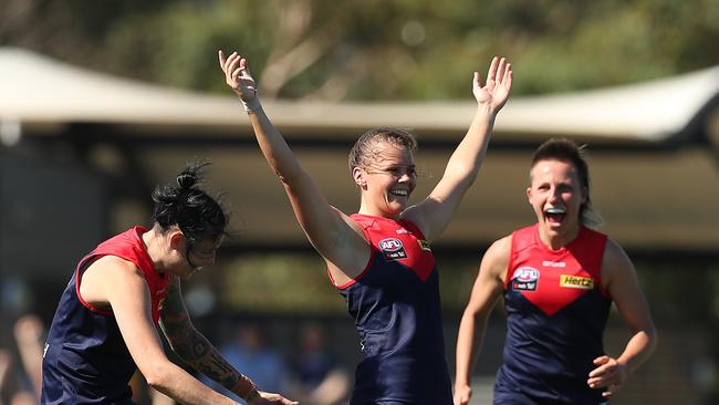 Maddi Gay celebrates with teammates after slotting a goal. Picture: Getty Images