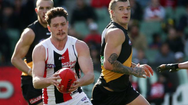 Jack Steven runs away from Richmond’s Dustin Martin. Picture: Colleen Petch