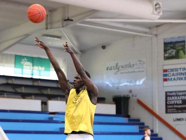 Pictured: South Sudanese-Australian college basketball power forward for the VCU Rams Kuany Kuany at the Taipans "open gym" day at Cairns Basketball. Contributed by Taipans Media.