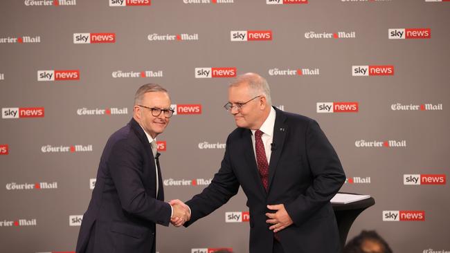 Mr Albanese was likely contagious when he conducted the People’s Forum Debate (above) in Brisbane and spoke to voters (Photo by Jason Edwards — Pool/Getty Images)