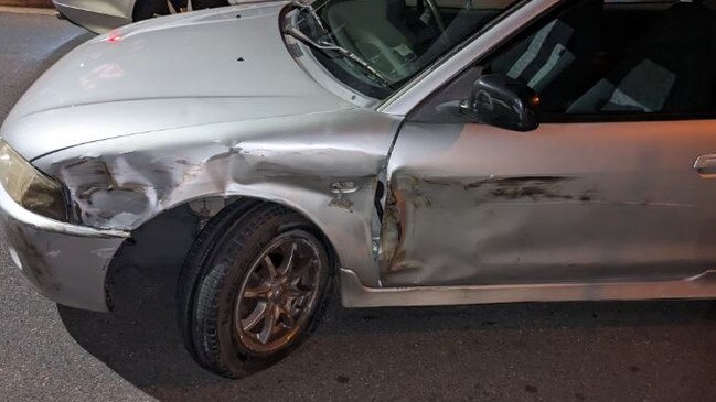 The silver Mitsubishi sedan which hit a parked car as the driver faces traffic offences. Picture: SAPOL