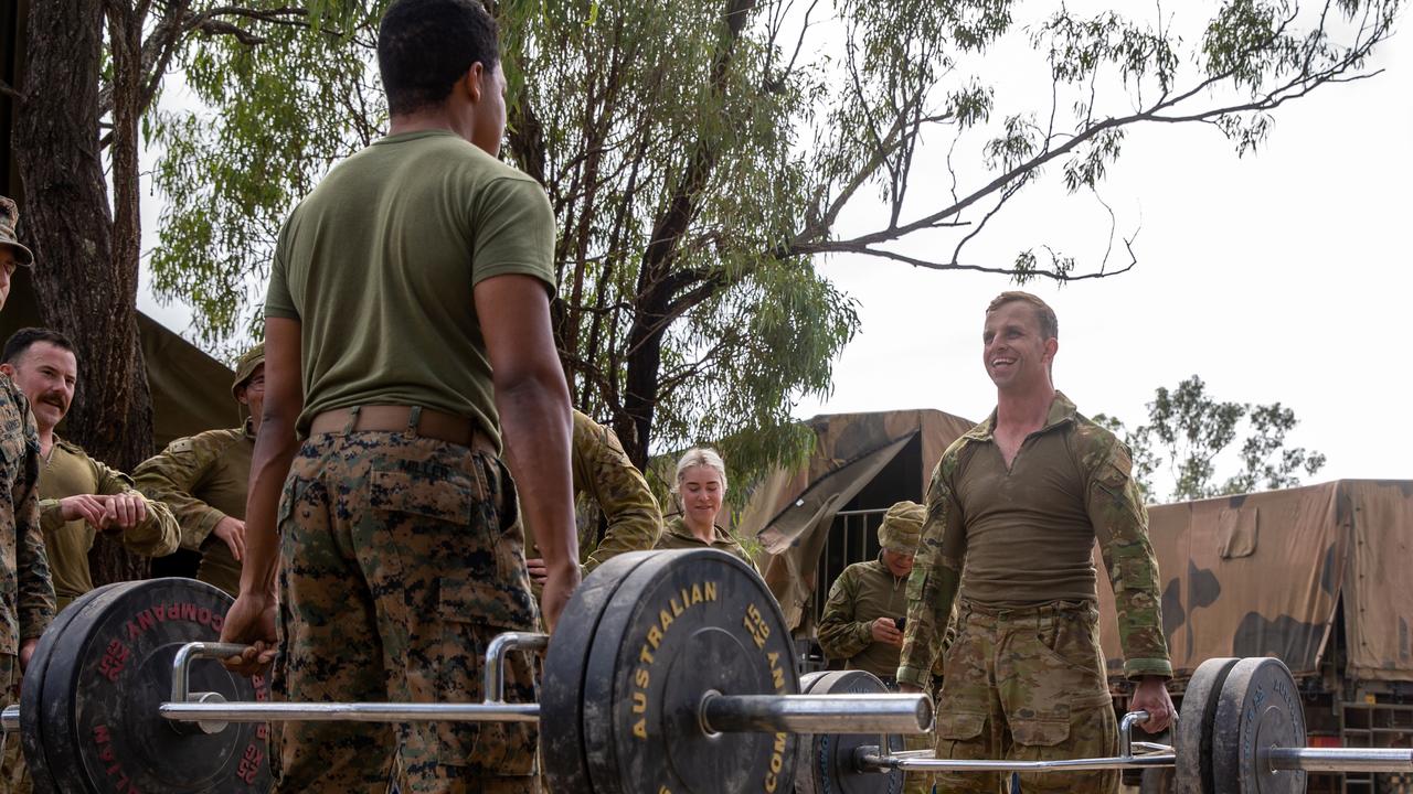 U.S. Marine Corps Staff Sgt. Jaylen Miller (left), a radar employment chief with 12th Marines, 3d Marine Division, and Australian Defence Force Pvt. Anthony Berekally, a petroleum operator with 7th Combat Service Support Battalion, compete in a fitness competition during Talisman Sabre 2021 at Camp Growl, Shoalwater Bay Training Area, Queensland, Australia, July 13, 2021. This is the ninth iteration of Talisman Sabre, a large-scale, bilateral military exercise between Australia and the U.S. involving more than 17,000 participants from seven nations. The month-long multi-domain exercise consists of a series of training events that reinforce the strong U.S./Australian alliance and demonstrate the U.S. MilitaryÃ¢â&#130;¬â&#132;¢s unwavering commitment to a free and open Indo-Pacific. Miller is a native of Louisville, Kentucky, and Berekally is a native of Adelaide, Southern Australia. (U.S. Marine Corps photo by Lance Cpl. Ujian Gosun)