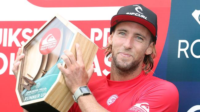 Matt Wilkinson with his runners-up trophy from the Quiksilver Pro at Snapper Rocks. Pic: Richard Gosling