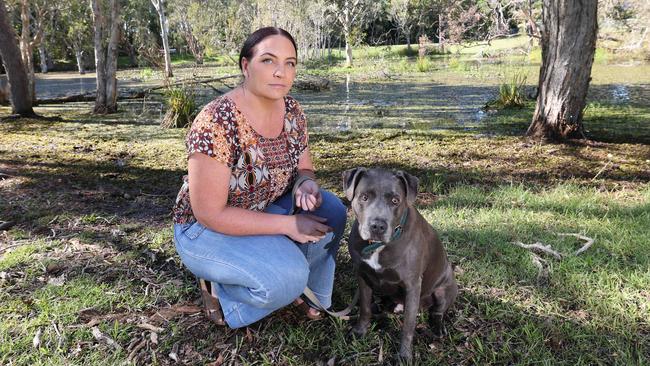 Labrador residents are calling for council to fence off a dangerous body of water after its latest casualty. According to locals the Musgrave pond is a disaster waiting to happen, Lauren Quilligan's dog, Mick Jagger, was rushed to an emergency vet after it was cut open by something beneath the surface.  Picture Glenn Hampson